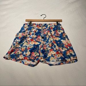 Blurred flower design and pattern in blue background.